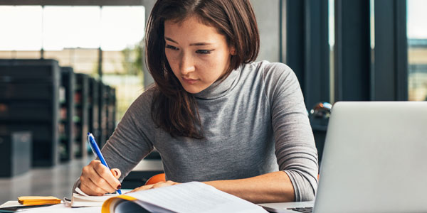 A police officer taking notes