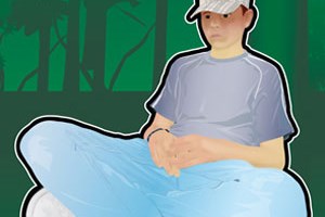 Young person sat up against a tree