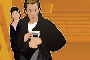 A teenager putting something in his bag